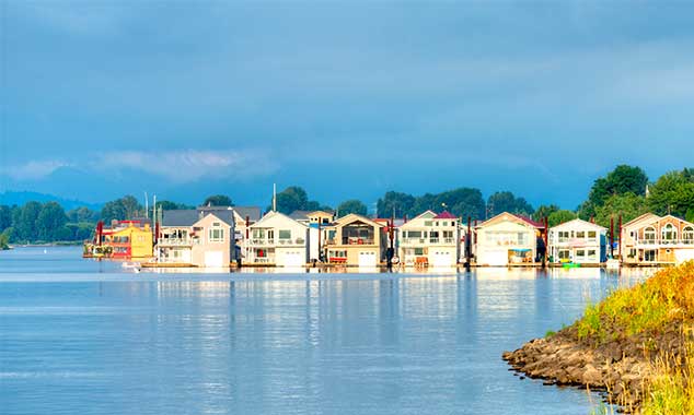 Row of floating homes on a River