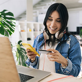 woman building credit with a secured credit card