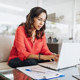 woman working on 2022 taxes